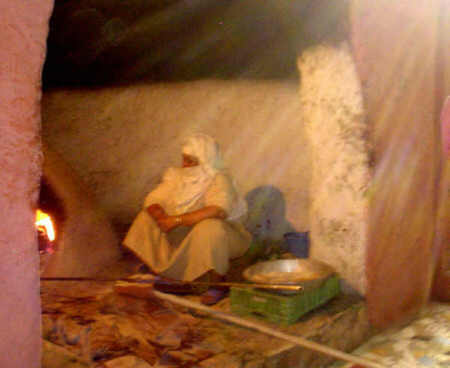 Berber Woman baking