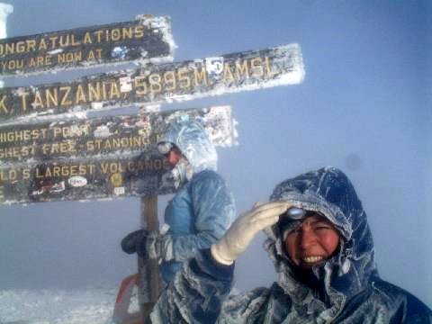 Sharon at the top of Kilimanjaro